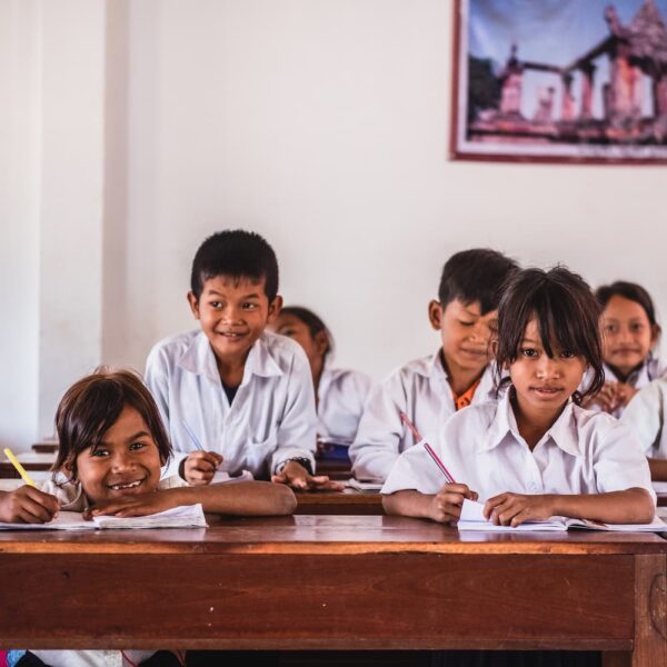 Cambodian students sitting in new classroom