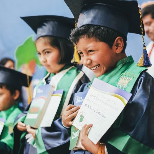 Boy disciple holding certificate after graduation