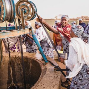 women in Kenya using the new village well